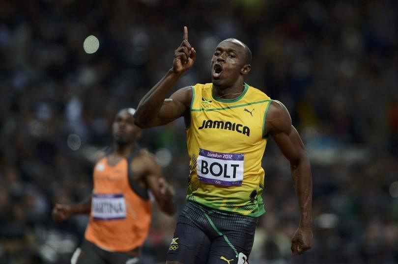 Jamaica's Usain Bolt dashes way to Olympic record, another gold