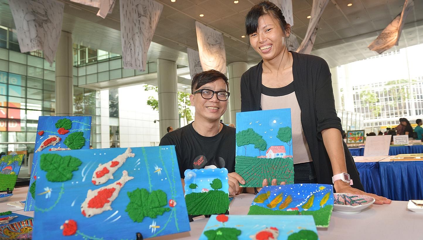 Mr Patrick Yee, 49, is a part-time art instructor with the Cerebral Palsy Alliance Singapore. He works with clients such as Ms Xiu Zhan, 29, to express their thoughts through non-verbal means with various materials. The organisation held an art exhib