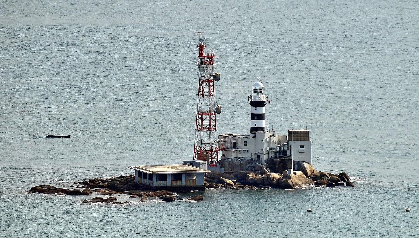 Singapore and Malaysia will set up a sub-committee to draw up maritime boundaries around the disputed areas of Pedra Branca (pictured), Middle Rocks and South Ledge.&nbsp;-- ST FILE PHOTO:&nbsp;ALPHONSUS CHERN