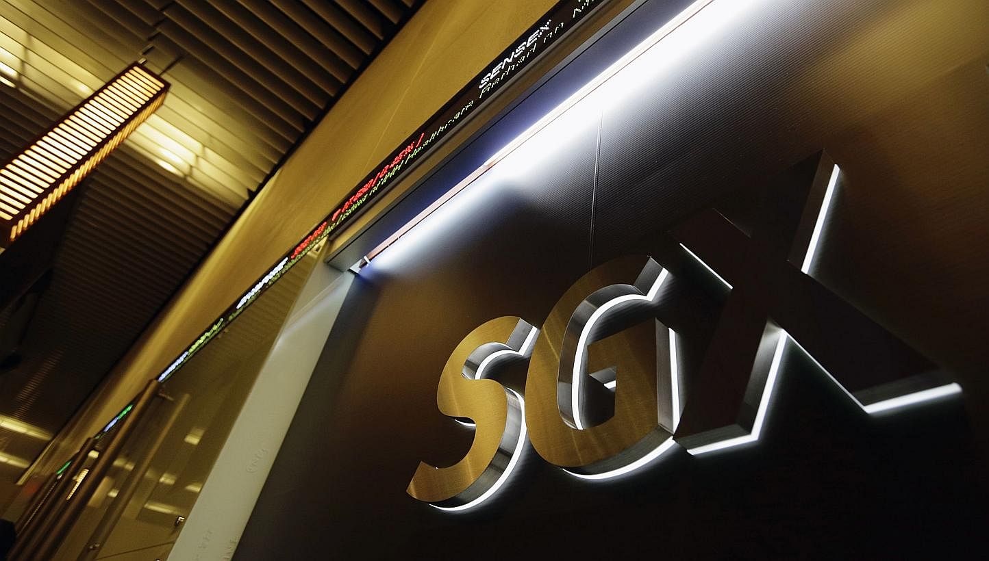 The logo of the Singapore Exchange (SGX) is pictured at its office in Singapore on July 25, 2012. Singapore&nbsp;stocks said farewell to 2013 on positive ground on Tuesday, Dec 31, 2013, ending the year just a tad above the level it started with. -- 