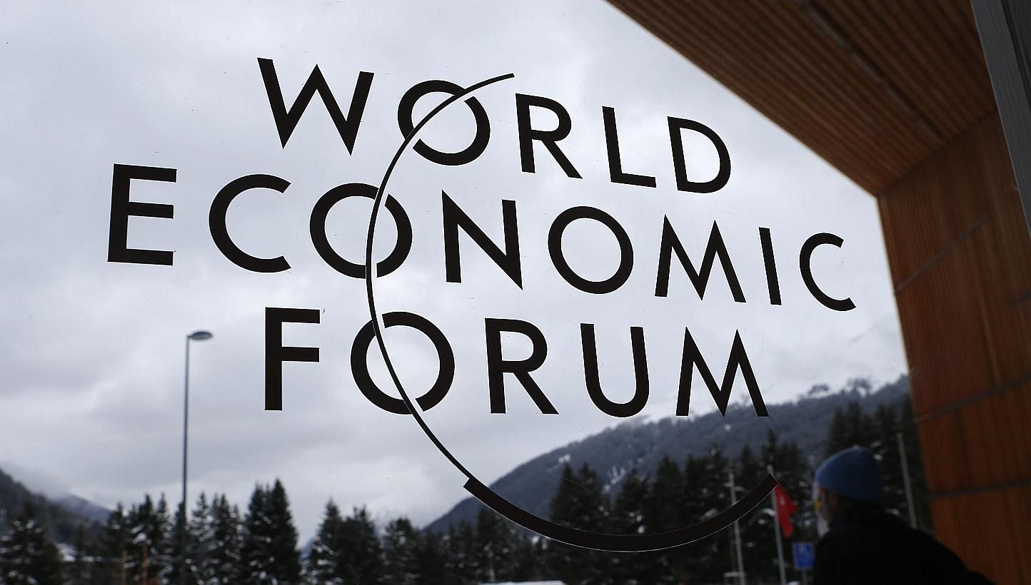 A sign is pictured on a door of the Congress Centre before the start of the annual meeting of the World Economic Forum 2014 in Davos on Tuesday, Jan 21, 2014. -- PHOTO: REUTERS