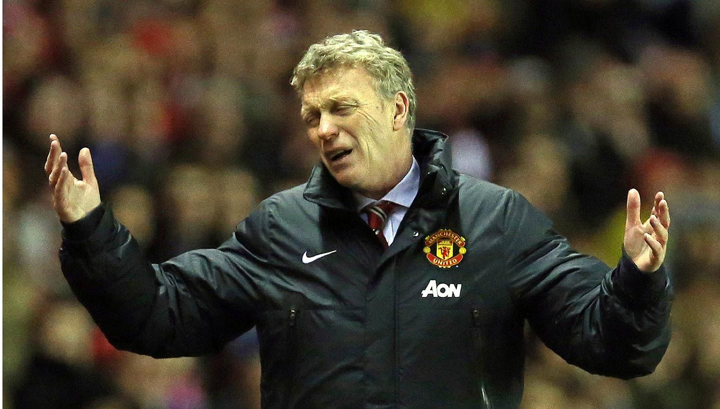 Manchester United’s Scottish manager David Moyes reacts during a League Cup semi-final first leg match between Sunderland and Manchester United at the Stadium of Light in Sunderland, in north-east England, on Jan 7, 2014. -- FILE PHOTO: AFP