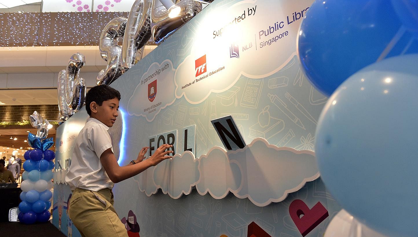 The launch of the RHB-The Straits Times National Spelling Championship (NSC) at Westgate Mall in Jurong East on Saturday, Jan 25, 2014. Spelling fever is set to reach a wider audience this year. -- ST PHOTO: DESMOND FOO