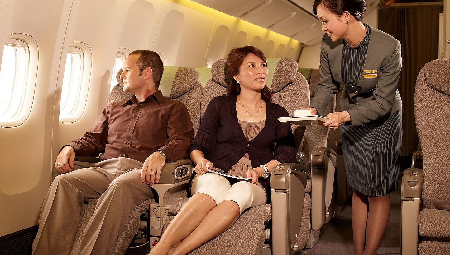 Premium service is one of the perks of premium economy class, available on a number of airlines. Singapore Airlines will introduce it next year. -- PHOTO: EVA AIR