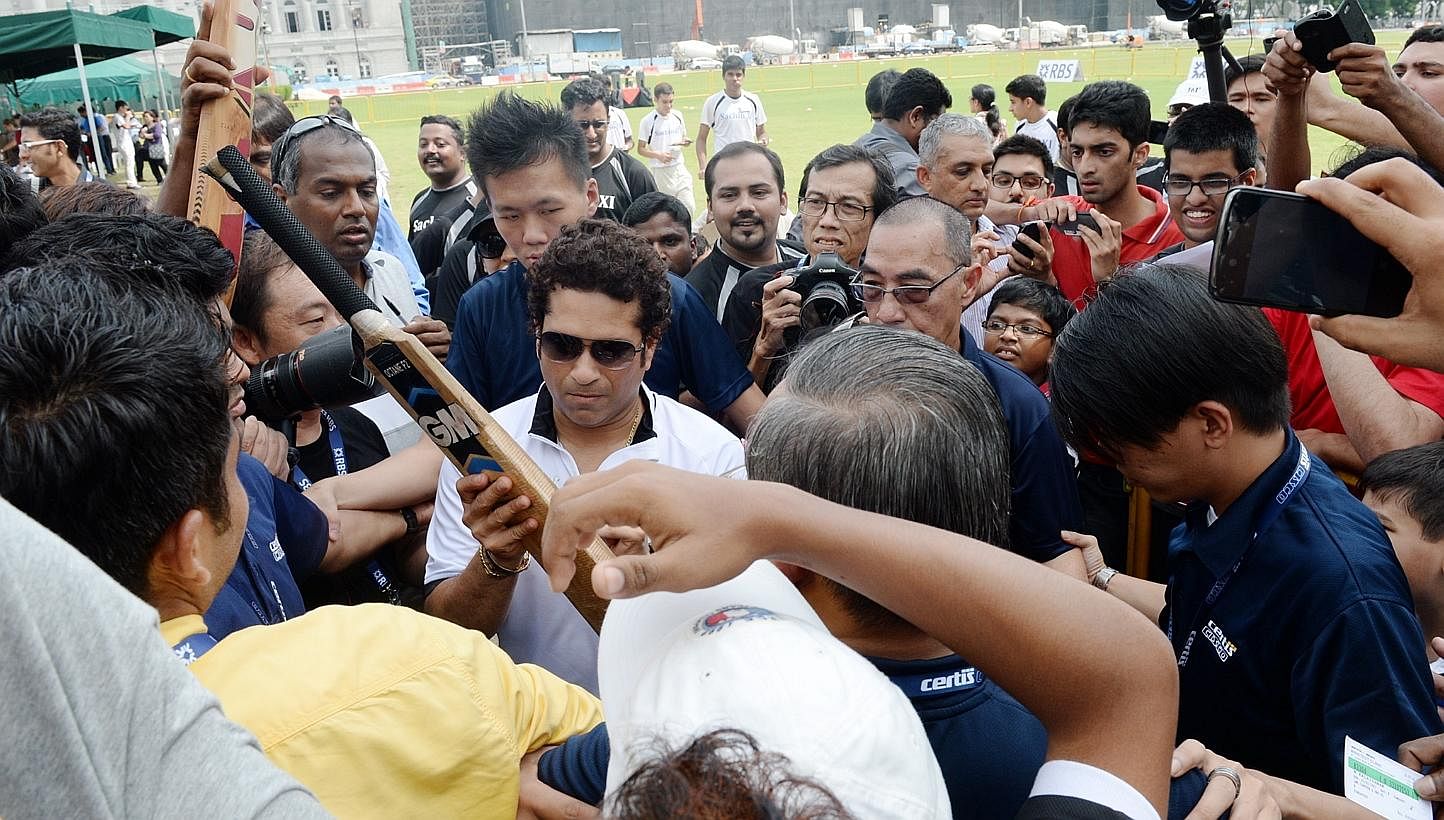 Legendary Indian cricketer Sachin Tendulkar shared his experiences and insights with a group of 30 young cricketers during a special coaching session at the Singapore Cricket Club on Tuesday morning.&nbsp;-- ST PHOTO: AZIZ HUSSIN