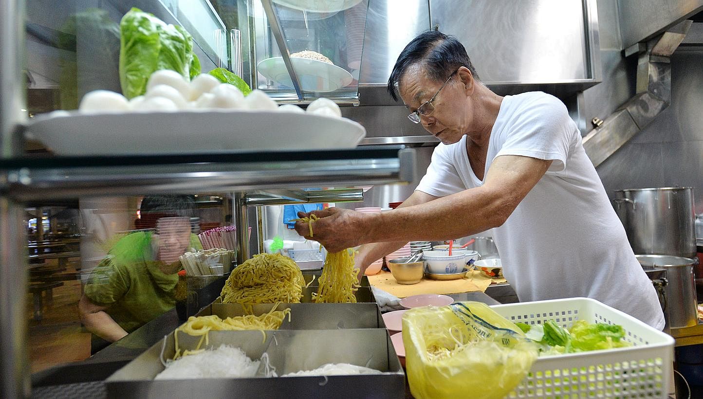 All the action happens before 11am at this stall (above), which sells fishball noodles and mushroom minced pork noodles -- PHOTO: LIM YAOHUI FOR THE STRAITS TIMES