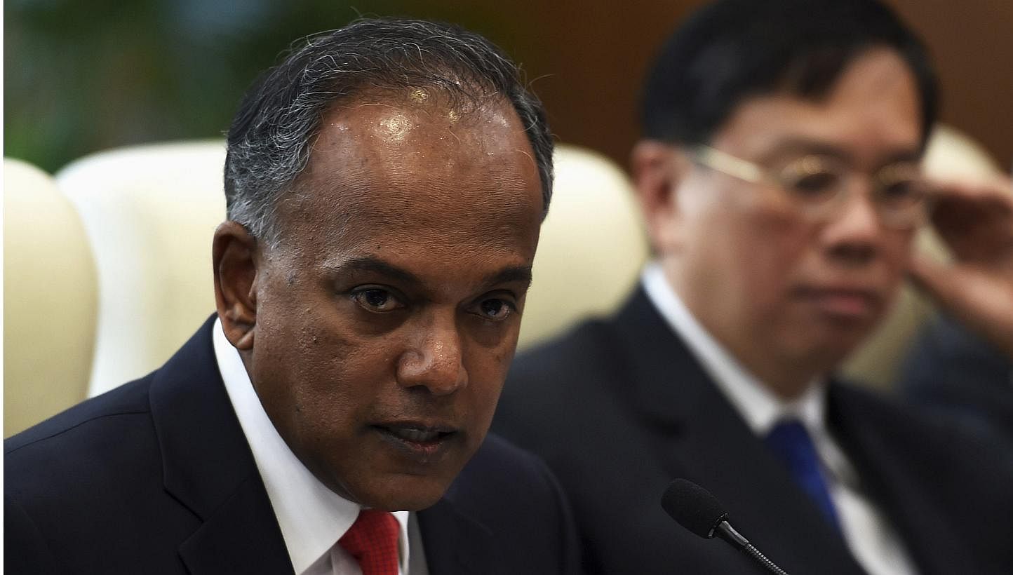 Singapore's Foreign Minister K. Shanmugam speaks during a meeting with China's Foreign Minister Wang Yi (not pictured) in Beijing on June 12, 2014. -- PHOTO: REUTERS