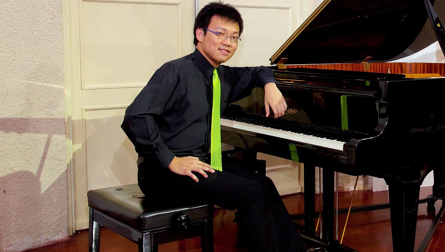 Pianist Thomas Ang showed his skill during his recital, masterfully performing pieces despite the rumbles coming from the National Day Parade preview that was being held nearby. -- PHOTO:&nbsp;PATRICK ANG