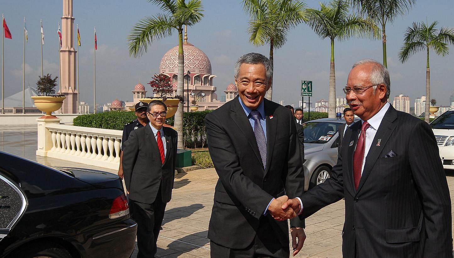 Prime Minister Lee Hsien Loong with Malaysia's Prime Minister Najib Razak at the Malaysia-Singapore Leaders' Retreat in Putrajaya in April. Mr Lee and Datuk Seri Najib enjoy a warm relationship and their resolution of a long-standing dispute over Mal