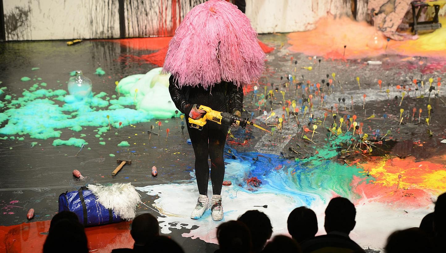 The performance Mystery Magnet, conceived by Belgian artist Miet Warlop, is a largely wordless show that speaks through a riot of colours and evocative scenes. -- PHOTO: CHONG YEW, SINGAPORE INTERNATIONAL FESTIVAL OF ARTS