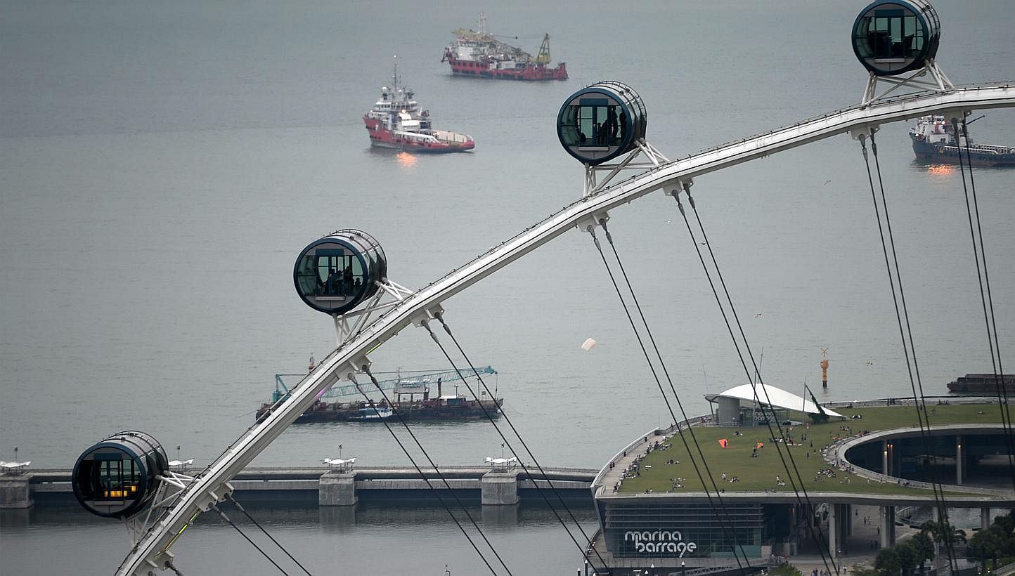 The troubled Singapore Flyer is within touching distance of a new owner after months of operating under receivership. -- PHOTO: ST FILE