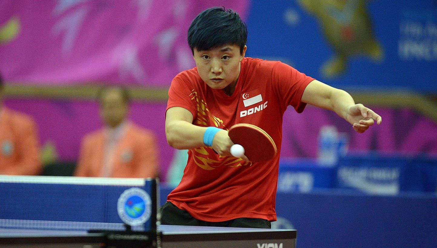 SINGAPORE table tennis player Feng Tianwei clinched the final medal for Singapore at the Incheon Asian Games on Saturday, winning a bronze in the women's singles competition at Suwon Gymnasium. -- ST PHOTO:&nbsp;DESMOND WEE