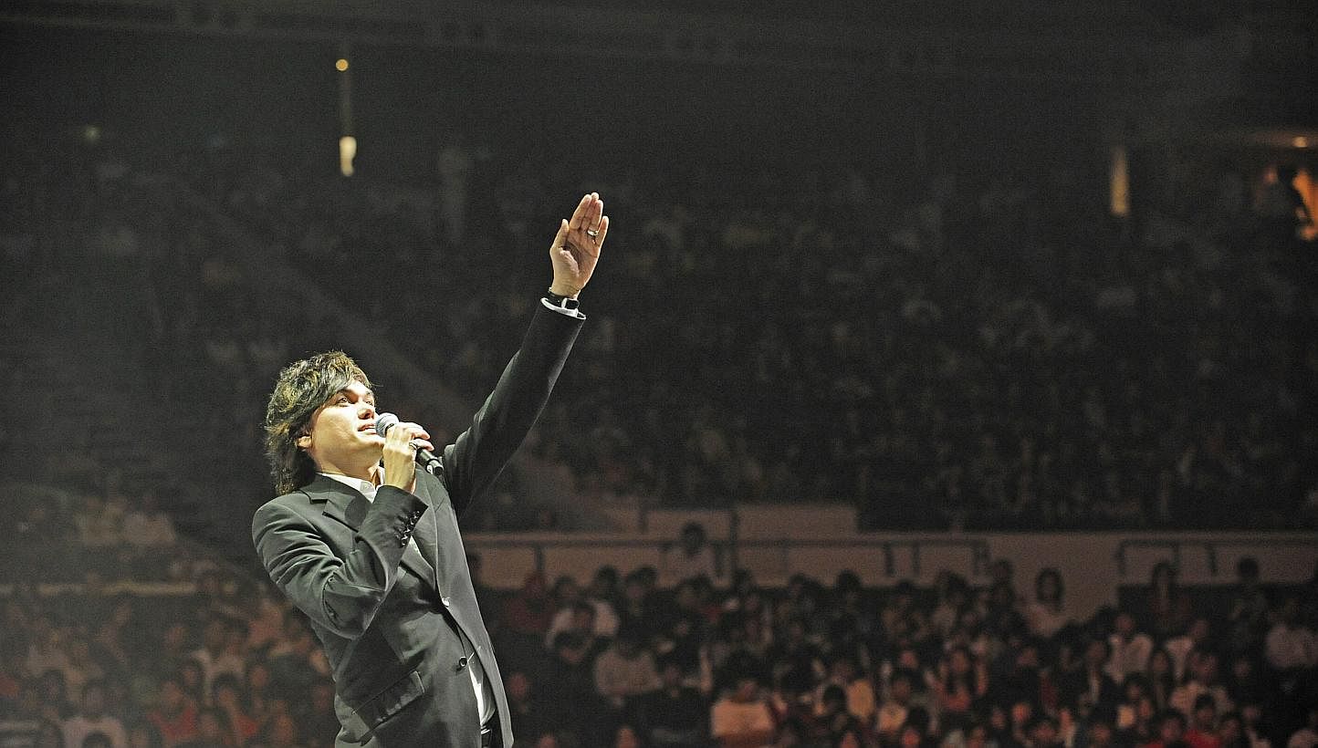 Pastor Joseph Prince's signature animated and dramatic style of preaching has won him fans and legions of followers at the church he founded, New Creation Church. He is preaching here at Singapore Indoor Stadium on Sep 28 to a full house. The church,