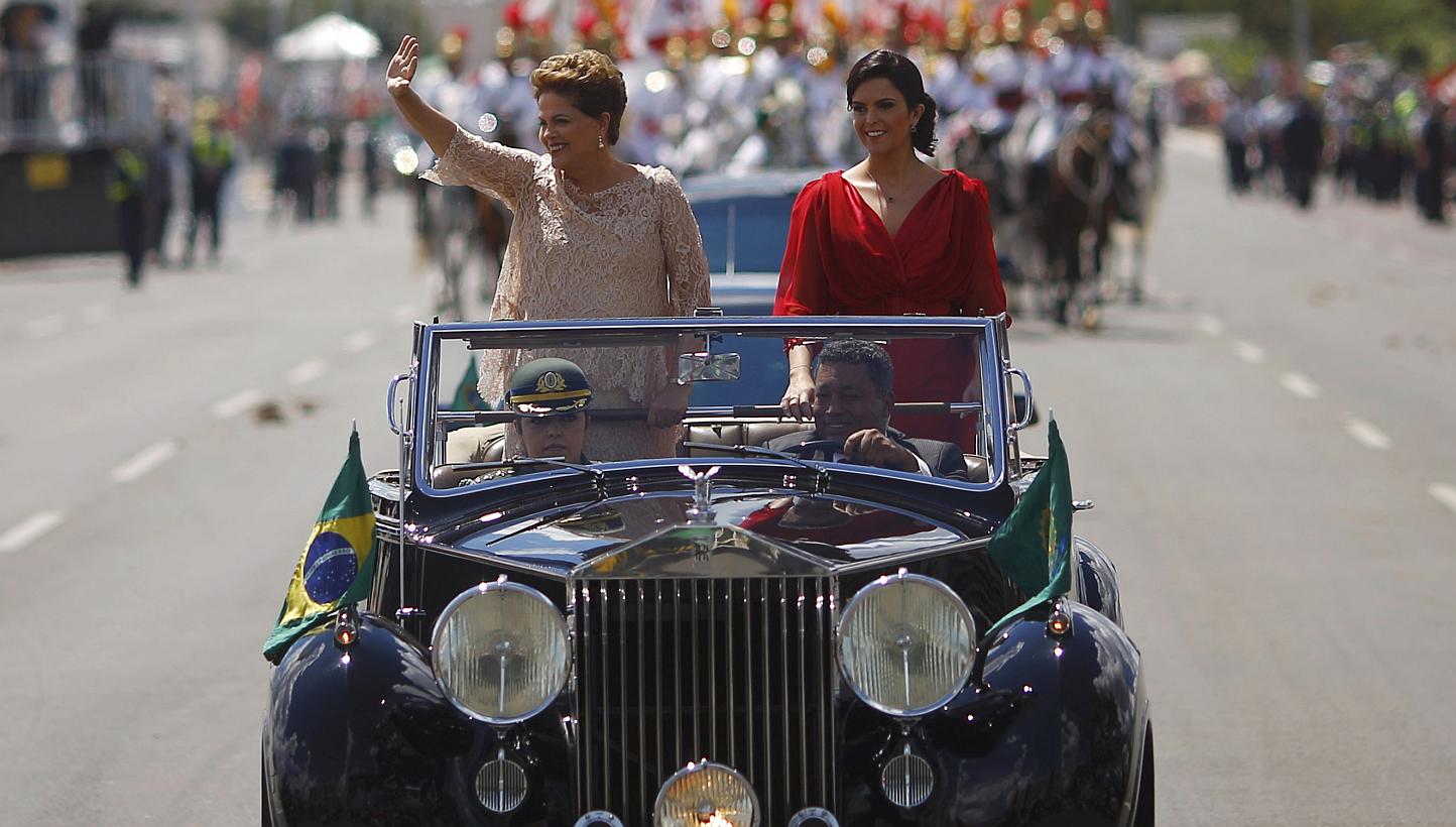 Brazil's President Dilma Rousseff (left) and daughter Paula riding towards Congress, where Ms Rousseff is to be sworn in for a second four-year term in Brasilia Jan 1, 2015. -- PHOTO: REUTERS
