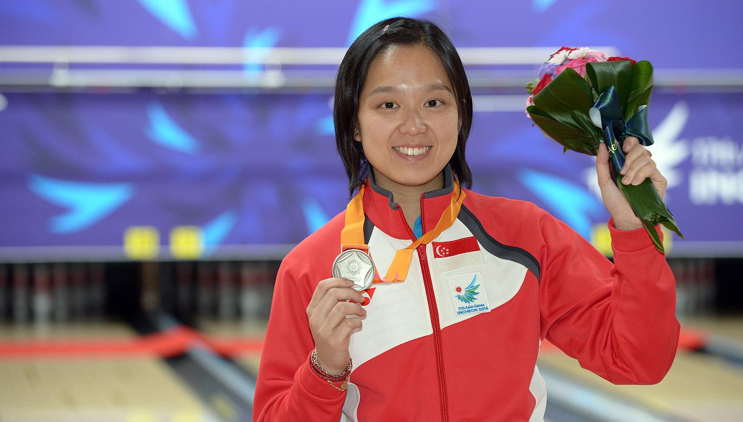 Bowler Jazreel Tan wins a silver medal in the 17th Asian Games Incheon 2014 women's singles bowling event held at the Anyang Hogye Gymnasium in Incheon, South Korea, on Sept 24, 2014. The Singaporen bowler has started 2015 on a roll by being cro