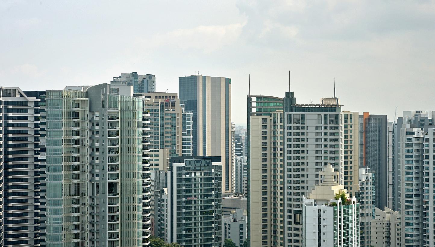Experts reckon that the slowdown in private property prices in the last quarter of 2014 was characteristic, thanks to the year-end holiday period, ailing demand and curtailed home financing. -- PHOTO: ST FILE