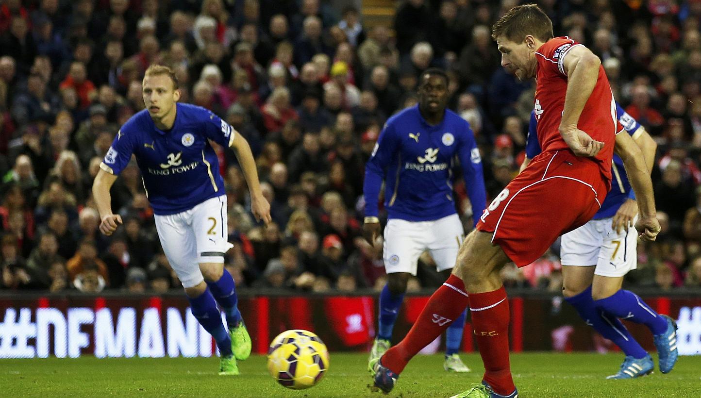 Liverpool's Steven Gerrard shoots to score a goal from a penalty during their English Premier League soccer match against Leicester City at Anfield in Liverpool, northern England Jan 1, 2015. -- PHOTO: REUTERS
