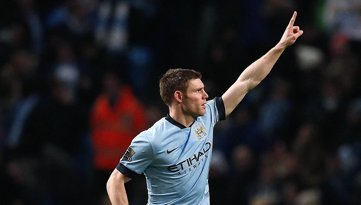Manchester City's James Milner celebrates after scoring during their FA Cup third round soccer match against Sheffield Wednesday at the Etihad stadium in Manchester, England, on Sunday. -- PHOTO: REUTERS.