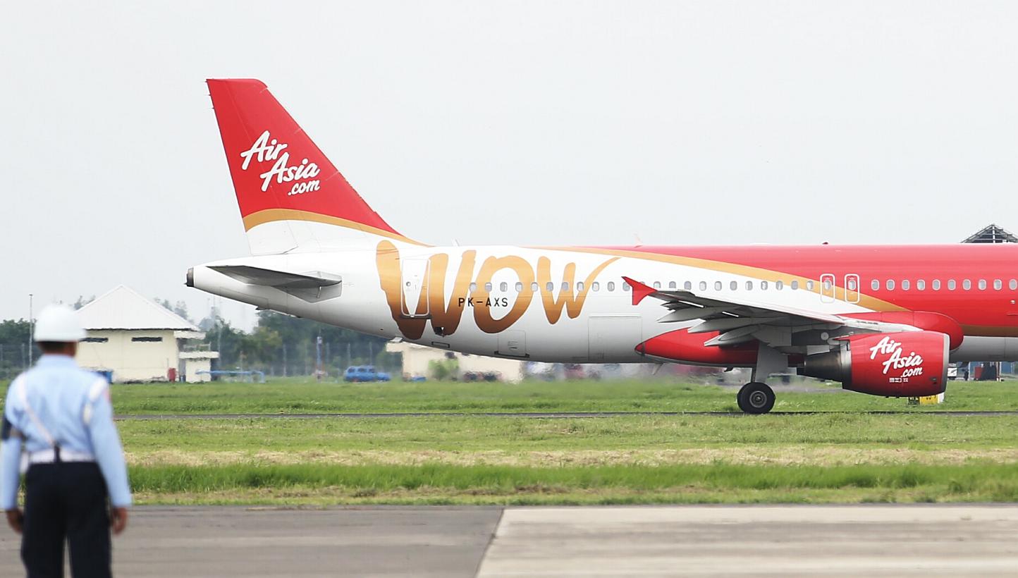 An AirAsia jet pictured in Surabaya on Jan 3, 2015. Questions have emerged over Indonesia AirAsia's pre-flight standard operating procedures, amid a war of words between the transportation minister and pilots angry with his reported comments on alleg