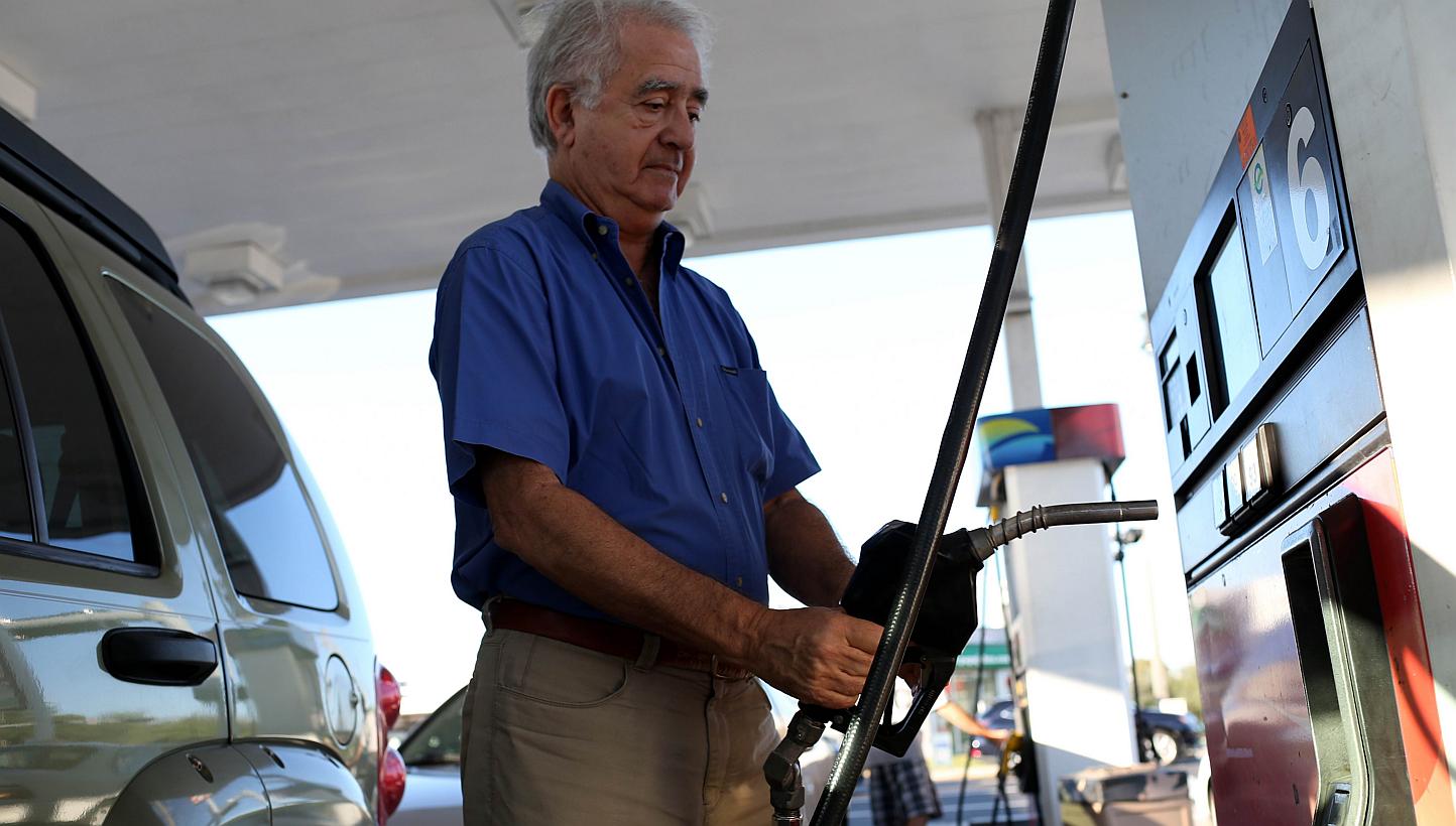 As oil prices plunge across the globe, petrol prices across the US drop even further much to the amazement of drivers finding veritable bargain prices at petrol stations like this one in Miami, Florida.-- PHOTO: AFP