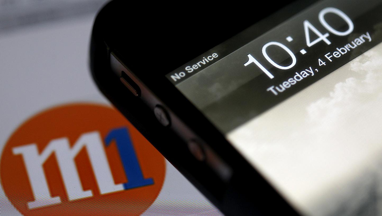 A mobile phone showing the 'No Service' signal from M1. -- PHOTO: ST FILE