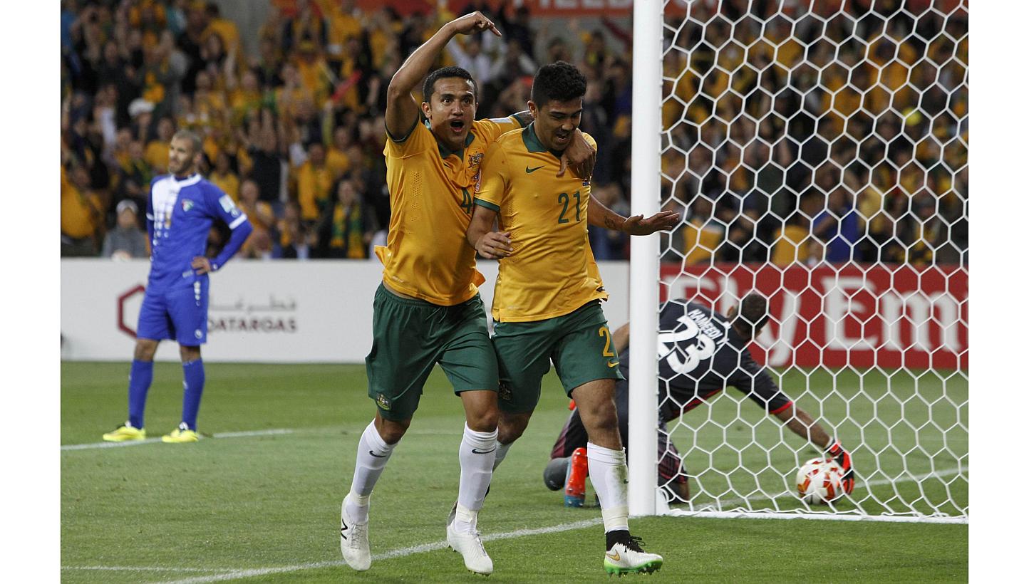 Australia's Massimo Luongo (right) celebrates his goal with teammate Tim Cahill during their Asian Cup Group A soccer match against Kuwait at the Rectangular stadium in Melbourne on Jan 9, 2015.&nbsp;Hosts Australia showed impressive firepower to bea