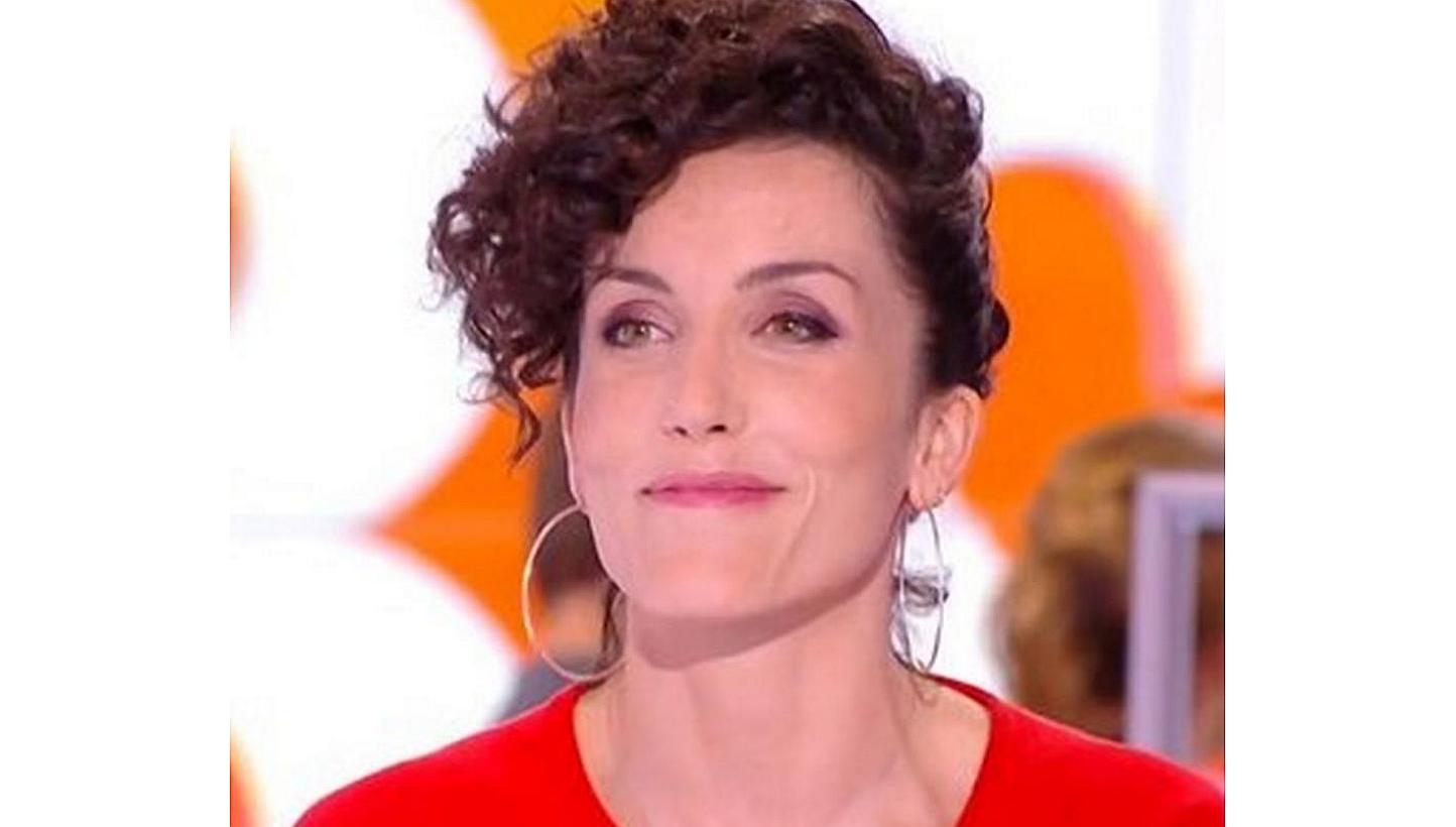 Cartoonist Corinne Rey said she was the one who let two gunmen into the office of satirical magazine Charlie Hebdo where she worked as she and her young child were "brutally threatened". -- PHOTO: LINKEDIN