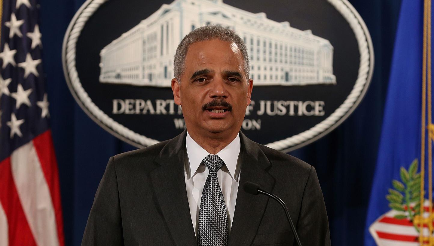 US Attorney-General Eric Holder (above) will attend international terror talks convened by France in Paris on Sunday after a deadly attack on a satirical newspaper, a Justice Department official said Thursday. -- PHOTO: AFP
