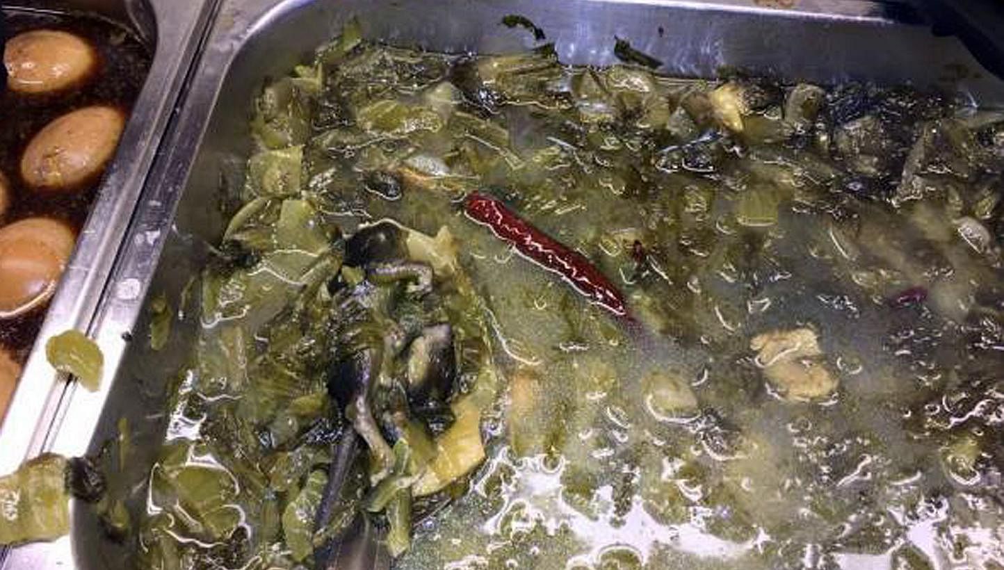 Chinese restaurant Hotpot Culture was suspended by the authorities after pictures of a rat carcass in a dish surfaced online. -- PHOTO: CARON CHAN
