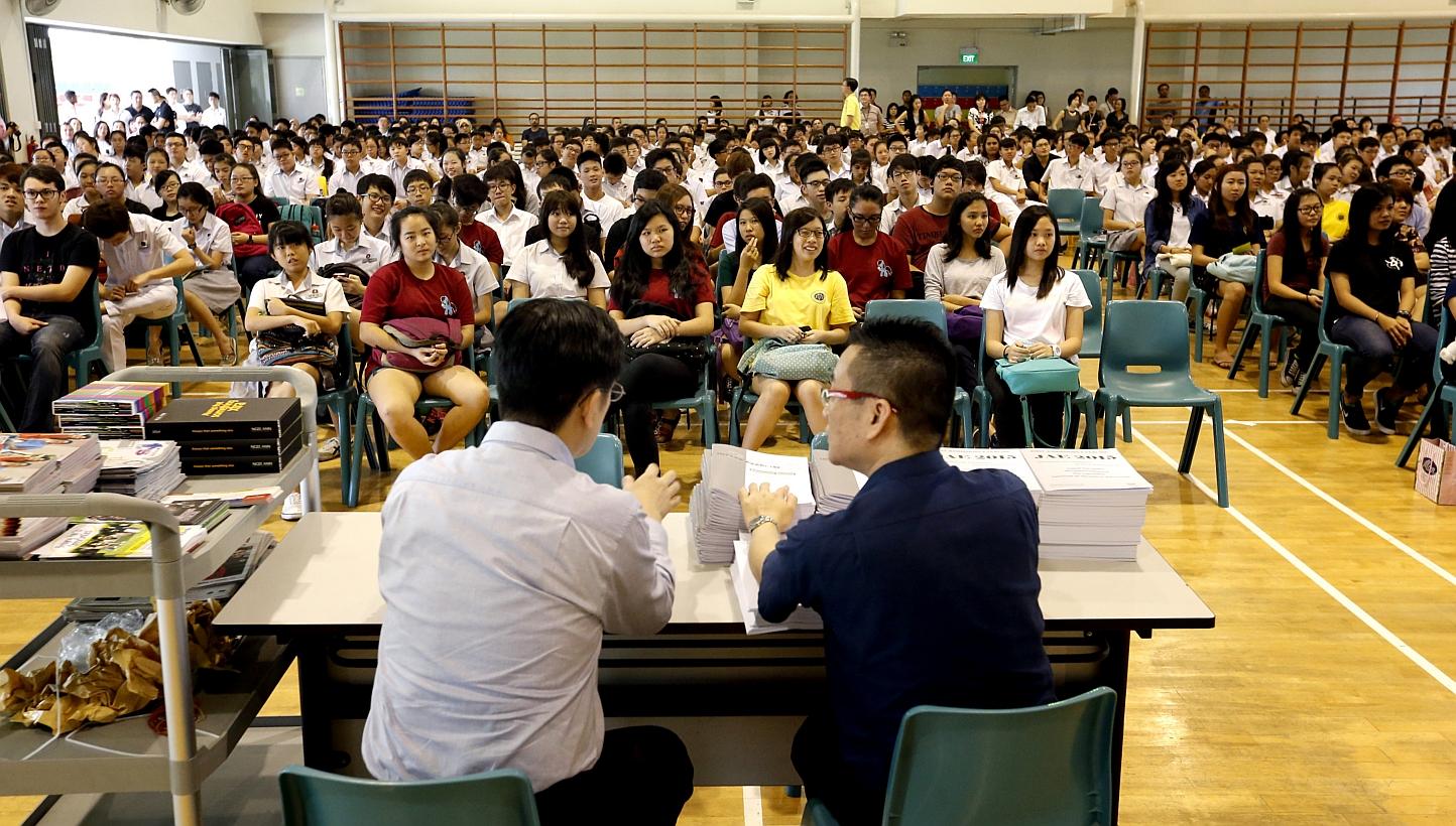 The first batch of Edgefield Secondary School students awaiting their GCE O-level examination results in the school hall on Jan 12, 2015. -- ST PHOTO: CHEW SENG KIM&nbsp;