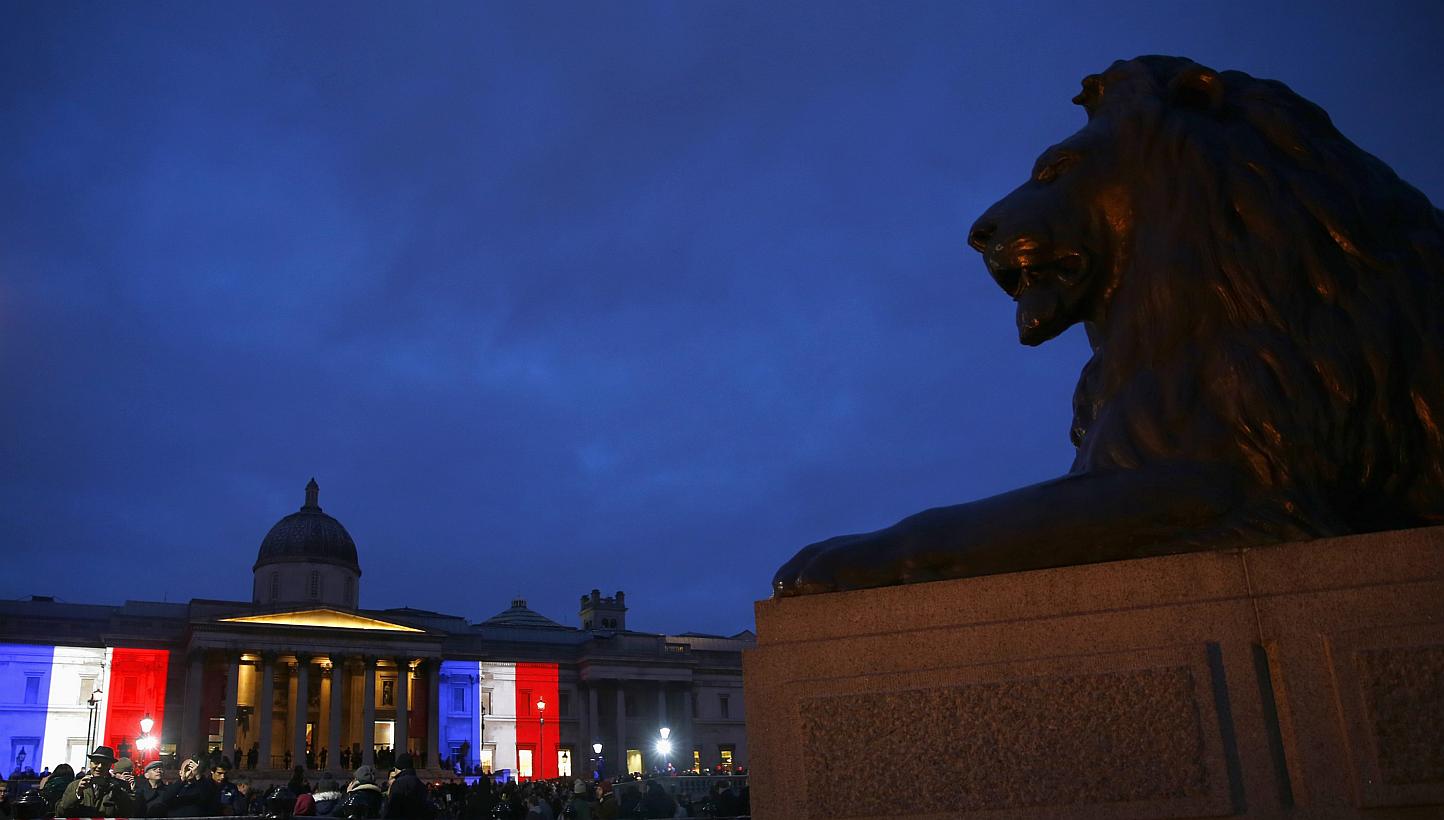 The colours of the French national flag are seen in Trafalgar Square as they are projected in tribute to the victims of the Paris terror attacks on the The National Gallery in London on Jan 11, 2015. Clearly, some journalists do believe that in such 