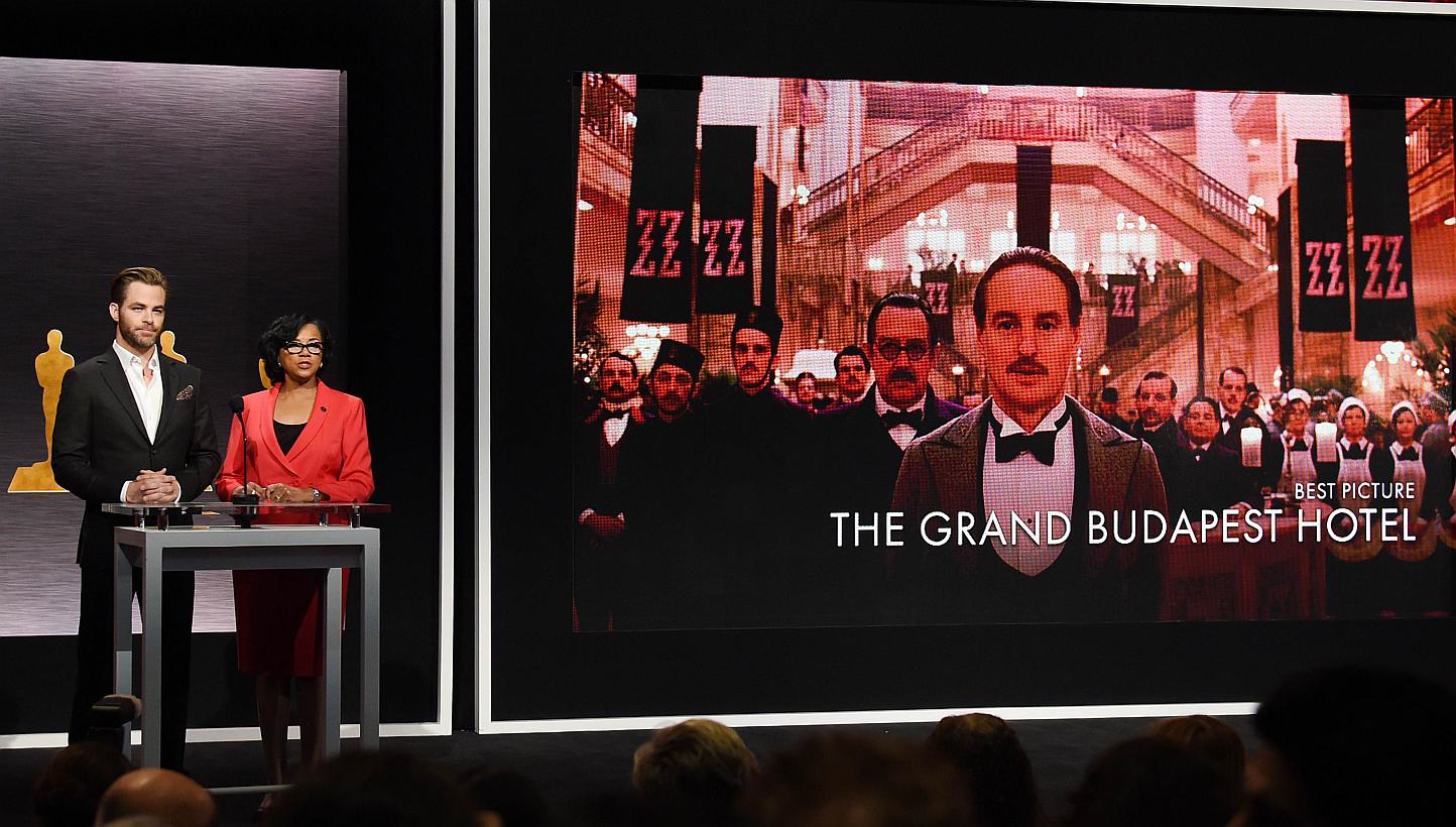 Hosts Chris Pine and Academy president Cheryl Boone announcing the movie 'The Grand Budapest Hotel' as one of the Oscar nominees for Best Picture. -- PHOTO: AFP