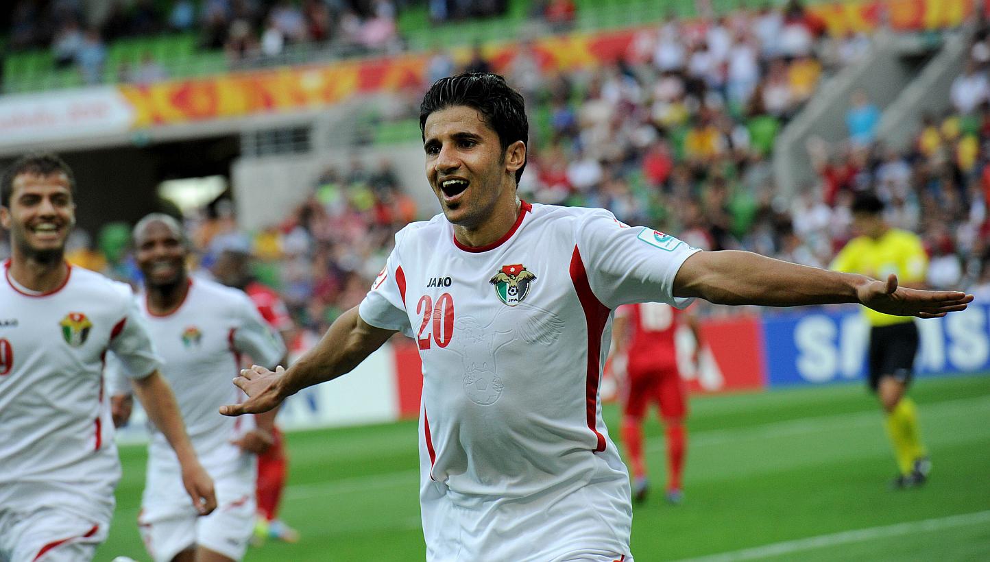 Hamza Aldaradreh of Jordan celebrates his third goal during the Group D Asian Cup football match between Palestine and Jordan in Melbourne on Jan 16, 2015. -- PHOTO: AFP