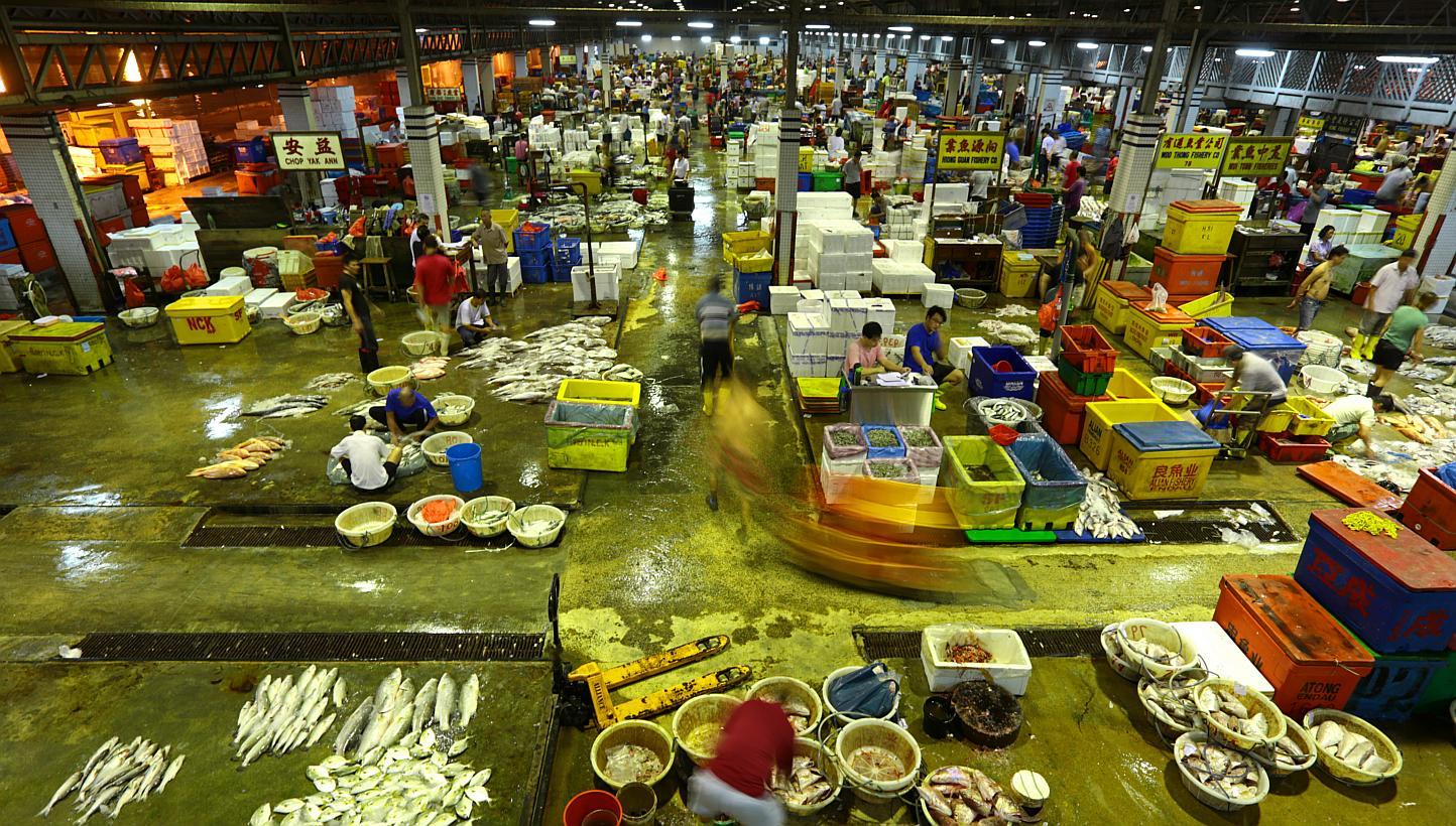 The wholesale fish market at the Jurong Fishery Port, where 250 tonnes of seafood is sold every day. -- PHOTO: THE NEW PAPER