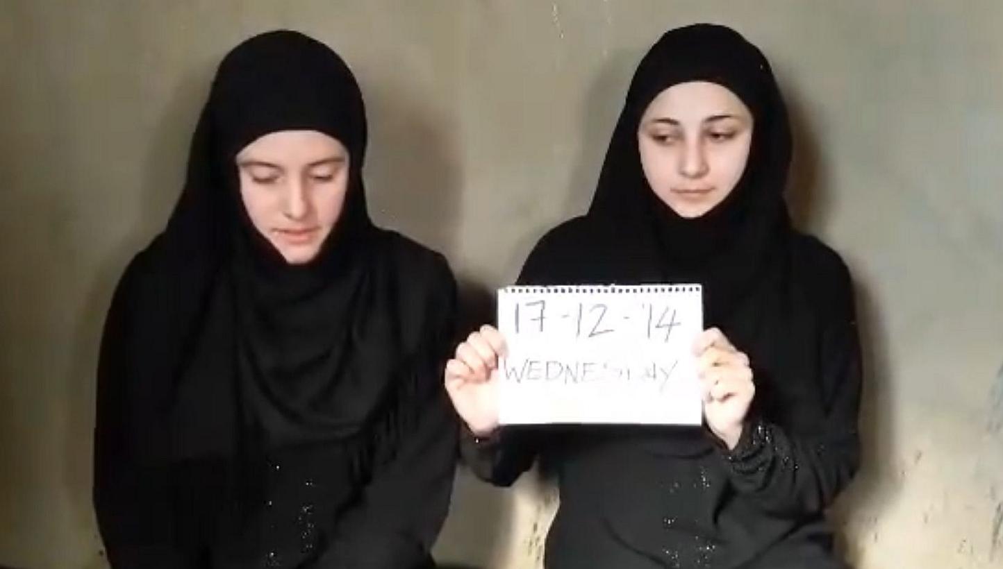 Italian aid workers Vanessa Marzullo and Greta Ramelli,&nbsp;taken hostage in Syria more than four months ago, have been released and will soon return home, Italy's government said on Thursday. -- PHOTO: AFP