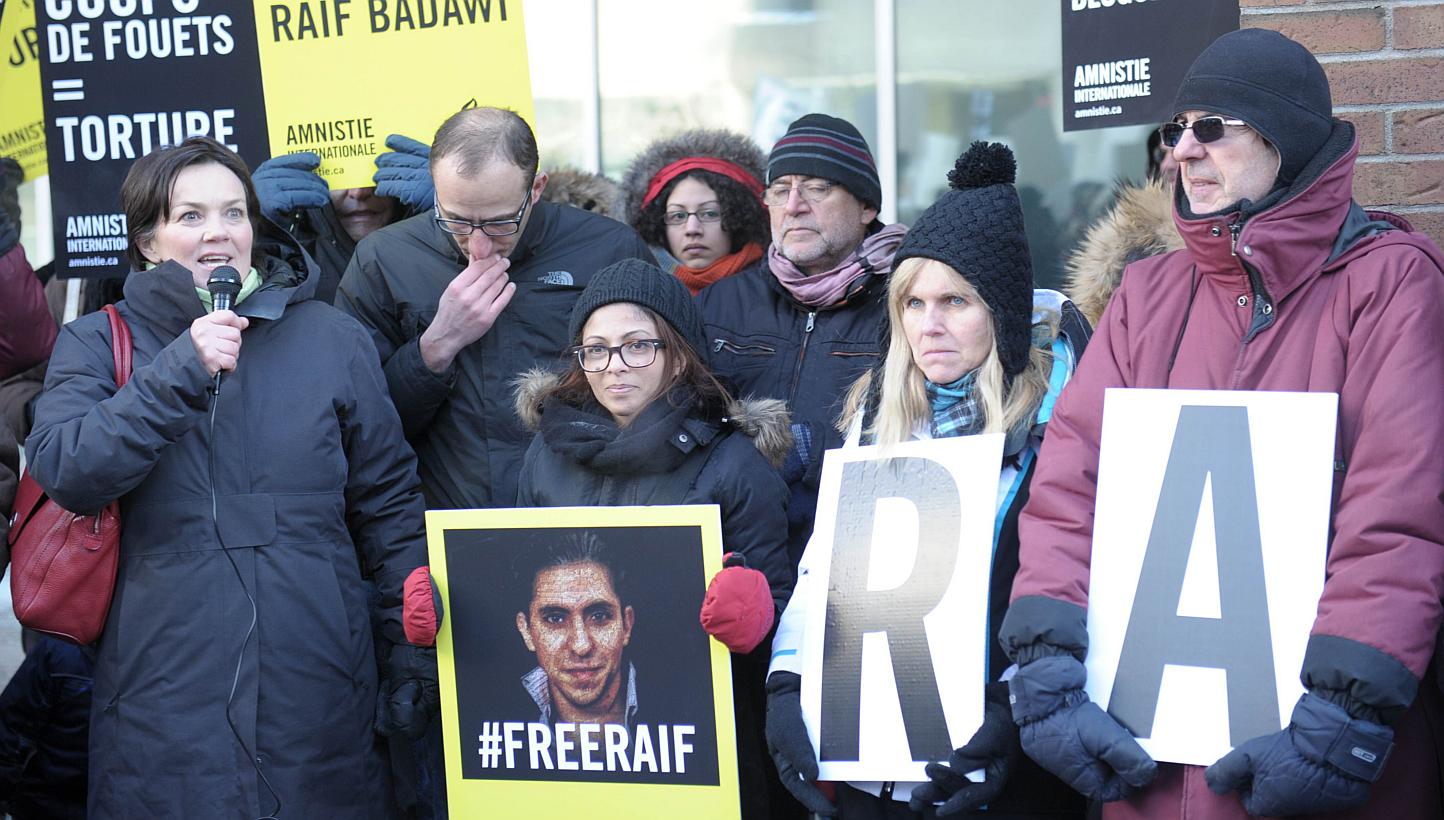Ensaf Haidar (centre), the wife of Saudi blogger Raef Badawi, holds a vigil in Montreal, Quebec on Jan 13, 2015 urging Saudi Arabia to free her husband who was flogged in public Jan 9, 2015 near a mosque in the Red Sea city of Jeddah, receiving 50 la