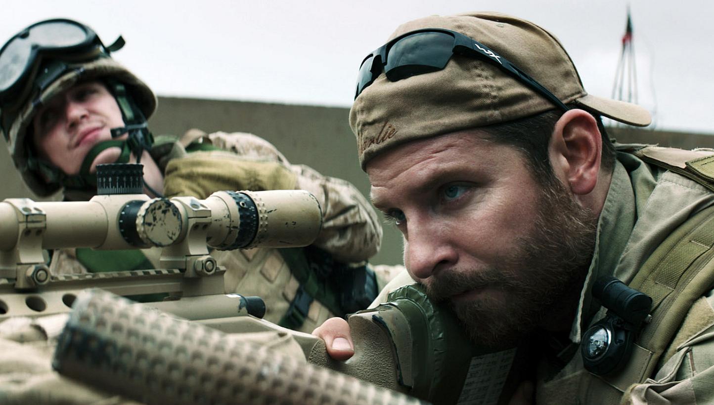 Sniper Chris Kyle (Bradley Cooper, above) is elevated into a man-myth in American Sniper because of his ability to kill with superhuman efficiency. -- PHOTO: GOLDEN VILLAGE
