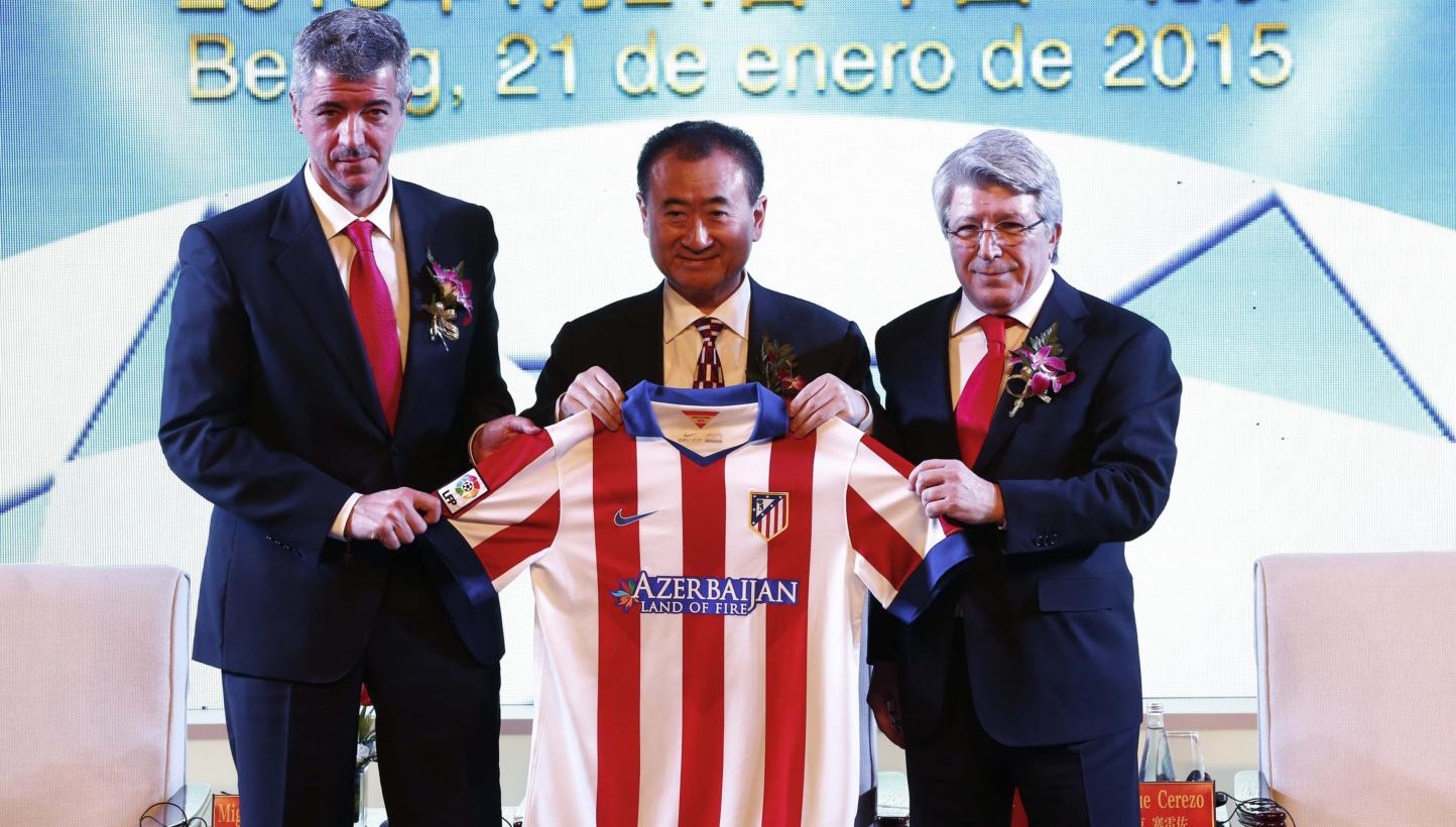 (From left) Atletico Madrid CEO Miguel Angel Gil, Wanda Group chairman Wang Jianlin and Atletico Madrid president Enrique Cerezo during an agreement ceremony in Beijing, China on Jan 21, 2015. -- PHOTO: EPA