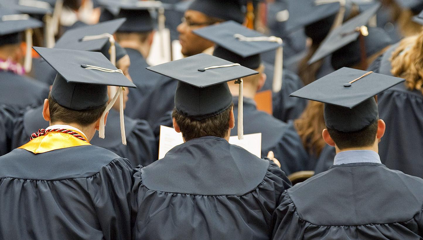 Graduates at Syracuse University's commencement ceremony at the Carrier Dome in Syracuse, New York, US. -- PHOTO: BLOOMBERG