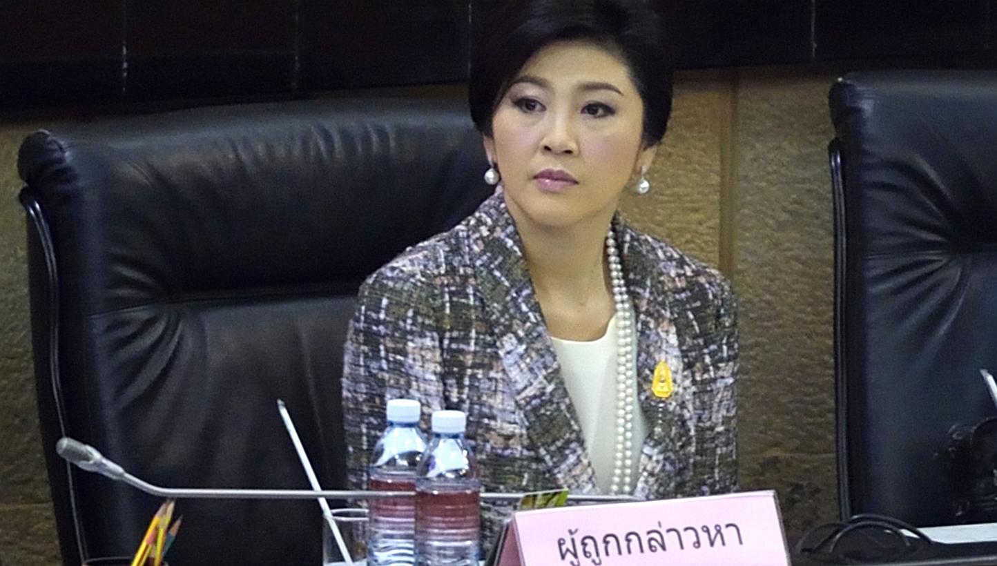Ousted Thai prime minister Yingluck Shinawatra looks on during impeachment proceedings by the military-stacked National Legislative Assembly (NLA) at the parliament in Bangkok on Jan 22, 2015. -- PHOTO: AFP