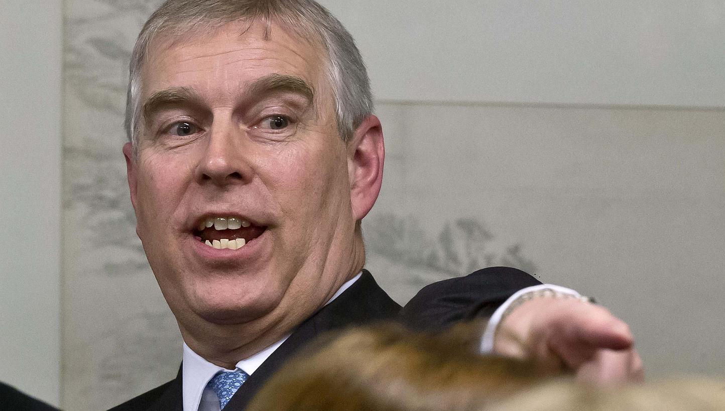 Britain's Prince Andrew gestures during a reception with business leaders on the sidelines of the World Economic Forum in Davos Jan 22, 2015. -- PHOTO: REUTERS