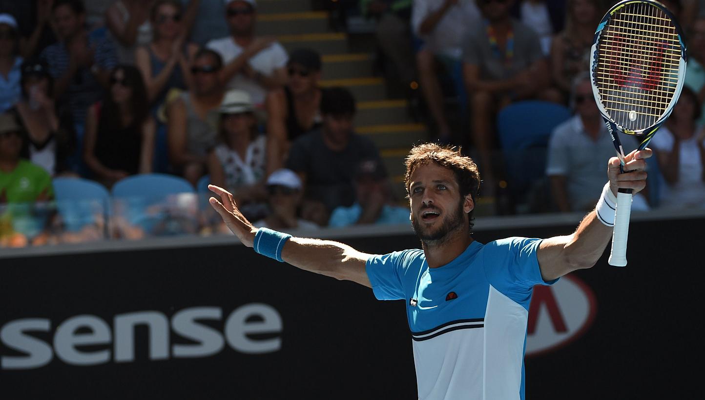 Feliciano Lopez of Spain celebrates his win over Jerzy Janowicz of Poland during the men's singles on day six of the 2015 Australian Open tennis tournament in Melbourne on Jan 24, 2015.&nbsp;Spaniard Feliciano Lopez showed a compassionate streak in a