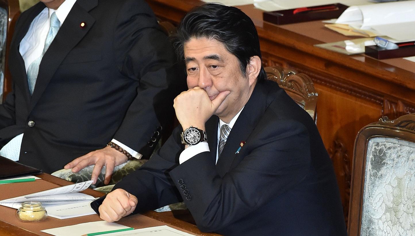 Japan's Prime Minister Shinzo Abe attends a session at the National Diet in Tokyo on Jan 26, 2015.&nbsp;The Japanese PM may leave out key descriptions of Japan's World War II conduct in a statement to be issued in August on the 70th anniversary of it