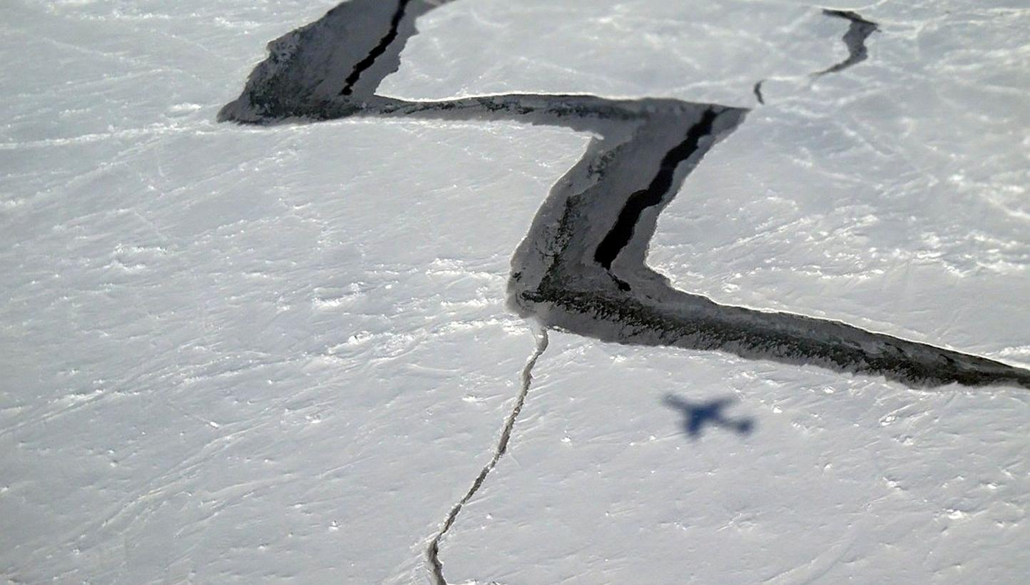 This Oct 27, 2014 handout photo provided by NASA shows the shadow of NASA’s DC-8 on Antarctic sea ice. -- PHOTO: AFP