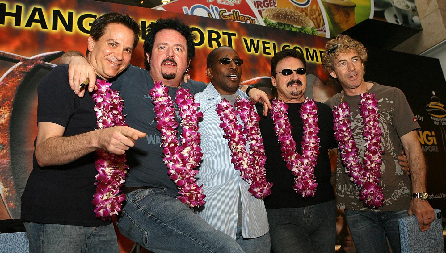  Legendary US rock group TOTO pose for photographs upon arrival at Changi Airport in Singapore in a 2006 file photo. -- PHOTO: AFP
