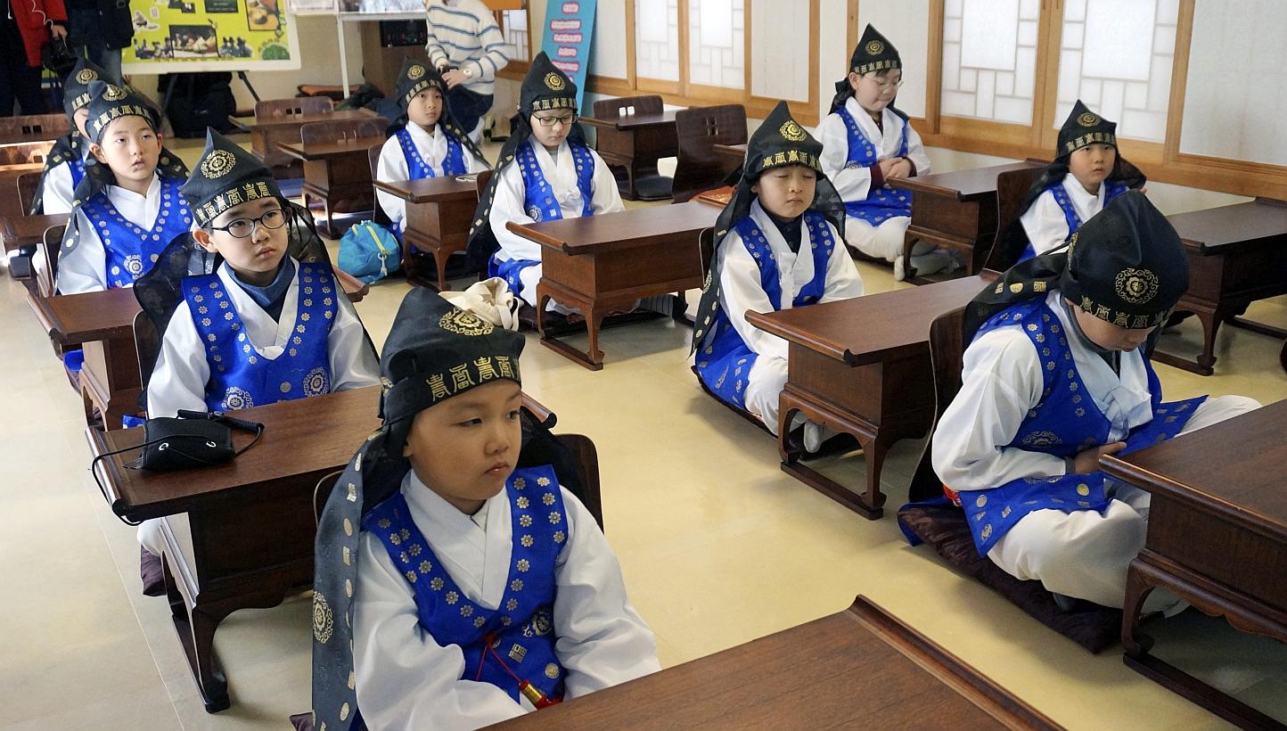 Children attend class at a 'Seodang', or traditional Korean school, in Seoul, South Korea, on Jan 13 2015. The government vowed on Tuesday to introduce a national qualification examination for workers at daycare centres for children amid rising
