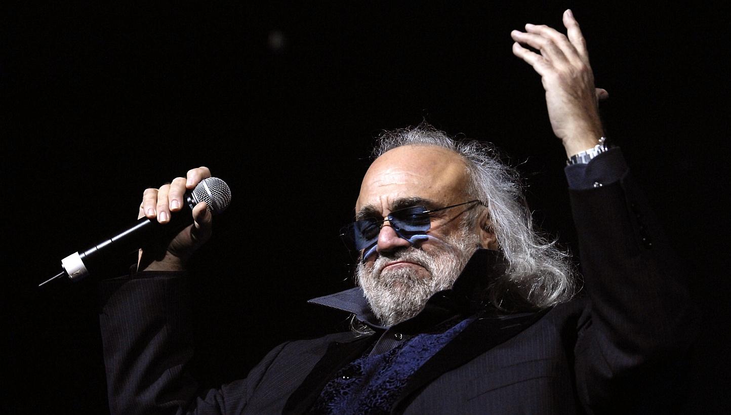 A file picture taken on Dec 15, 2006 in Paris, shows Greek singer Demis Roussos performing on the stage of the Zenith music hall. Roussos died during the weekend of Jan 24 and 25, 2015 in Athens, according to the sources at the hospital.&nbsp;-- PHOT