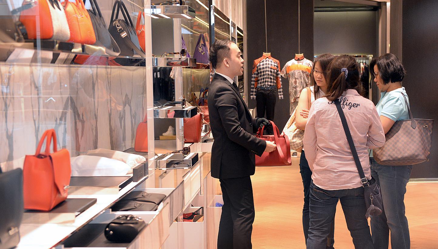 Looking at professions, the biggest shortfall was for service and sales workers, including shop sales assistants, security guards and waiters. -- PHOTO: ST FILE