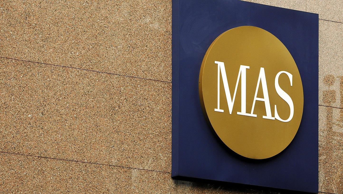 Singapore's central bank, the Monetary Authority of Singapore (MAS), unexpectedly eased monetary policy, sending the currency to the weakest since 2010 as the country joined global policy makers in shoring up growth amid dwindling inflation. -- PHOTO