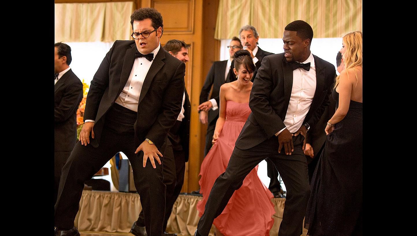 Josh Gad (left) is the friendless groom who meets a hustler best man for hire (Kevin Hart, right). -- PHOTO: SONY PICTURES